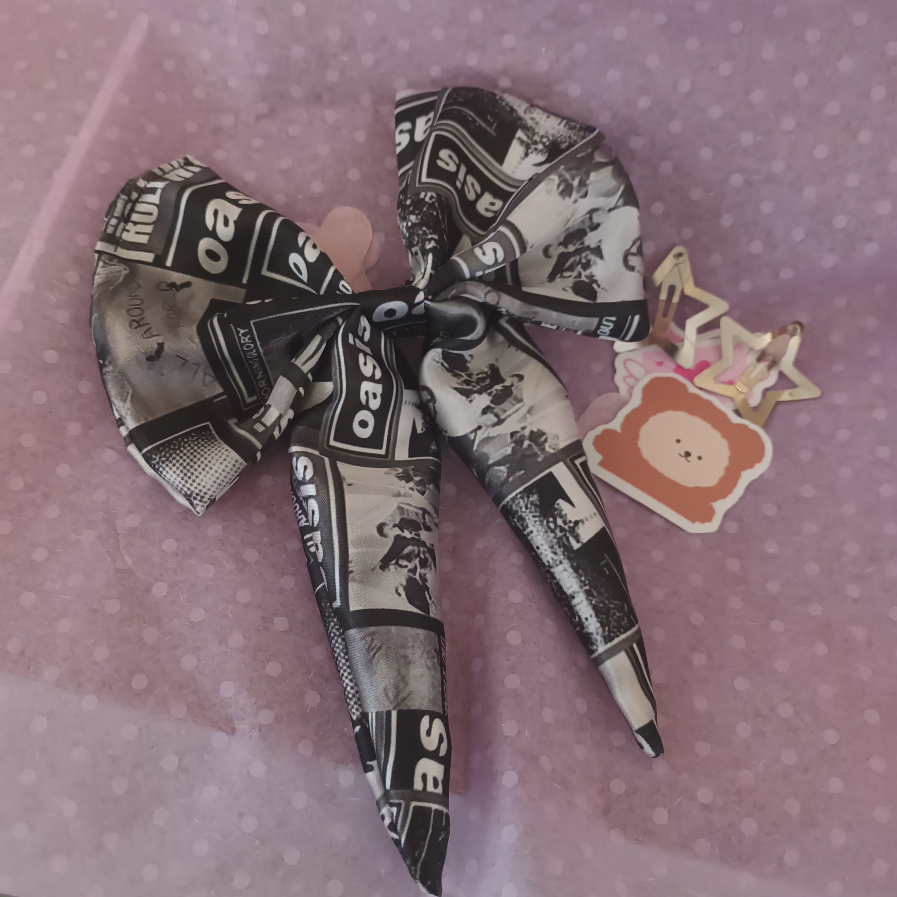 Oasis satin fabric hair bow on a clip