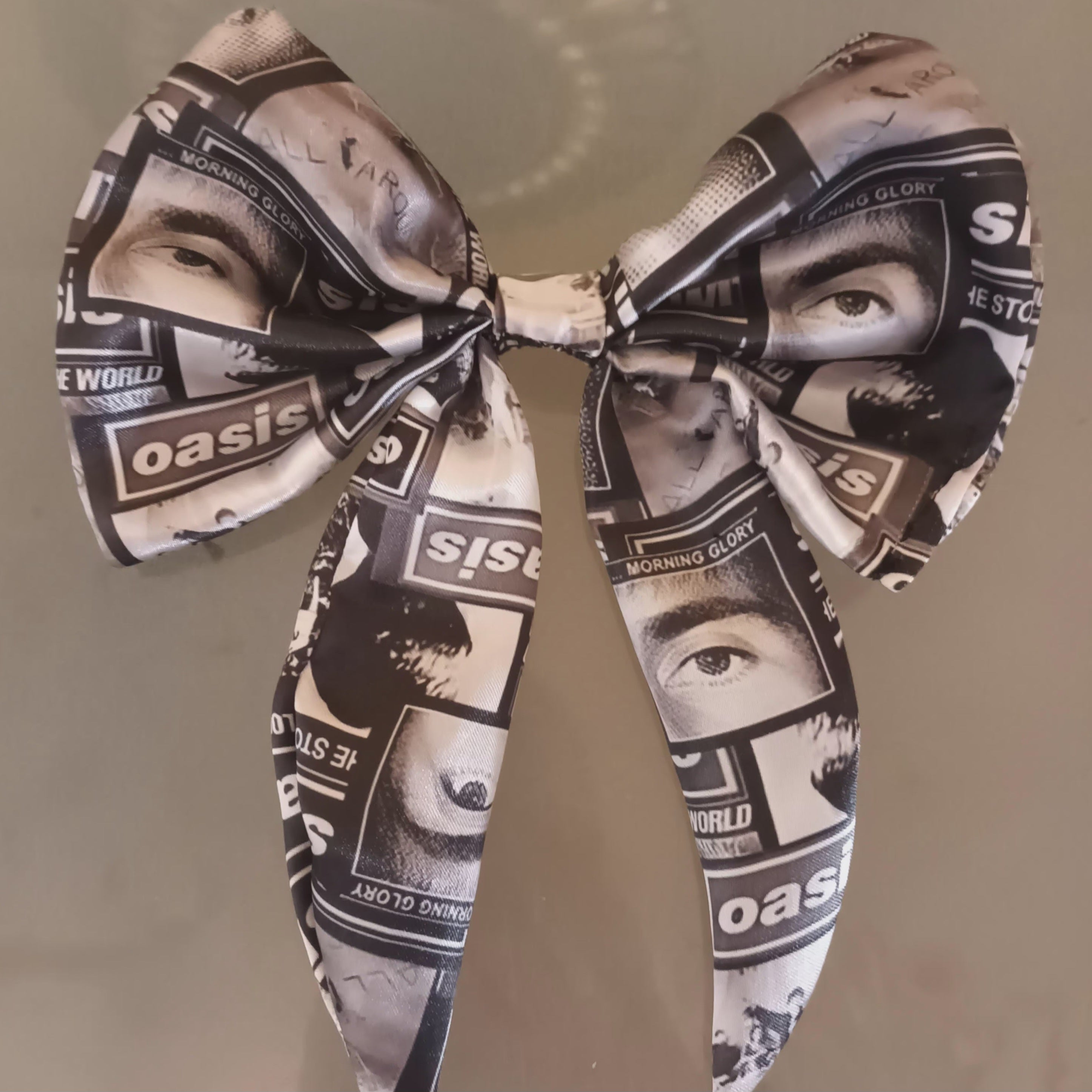 Oasis satin fabric hair bow on a clip