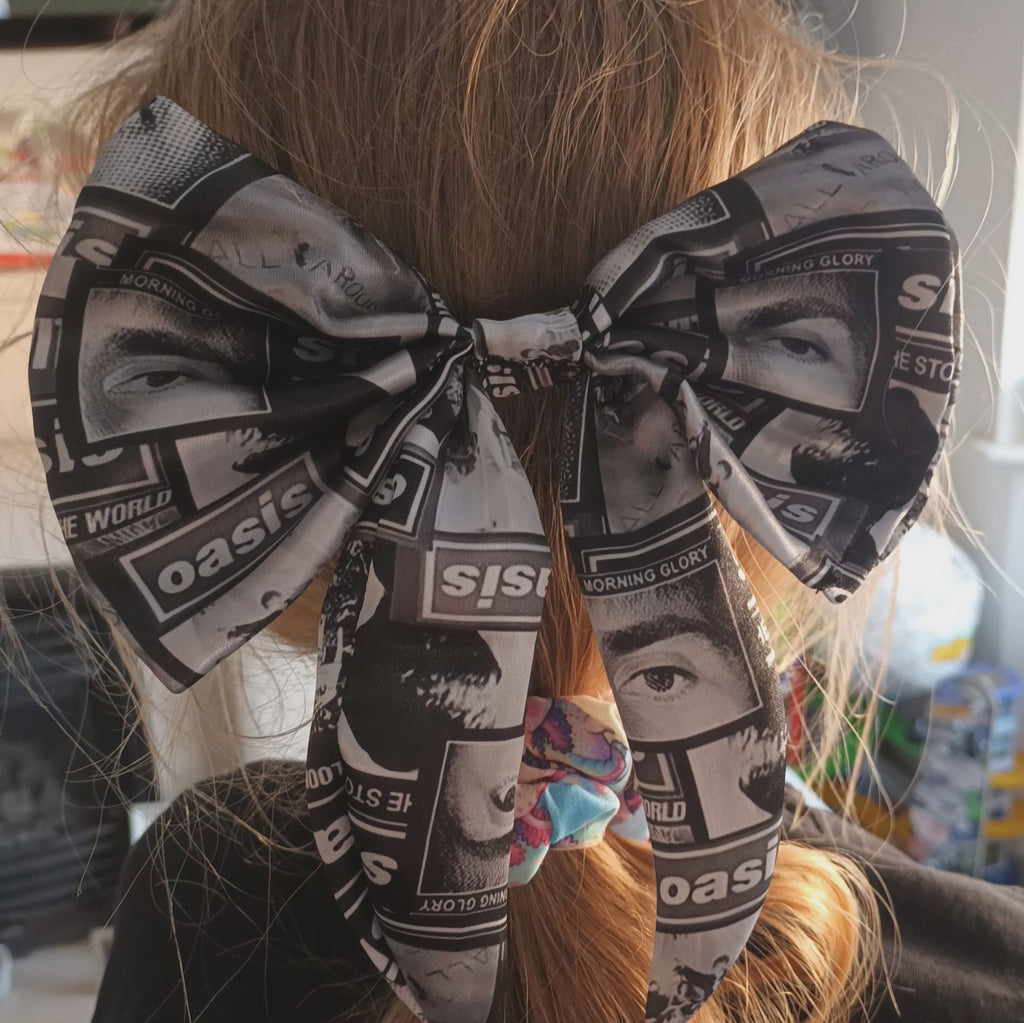 Oasis satin fabric hair bow on a clip