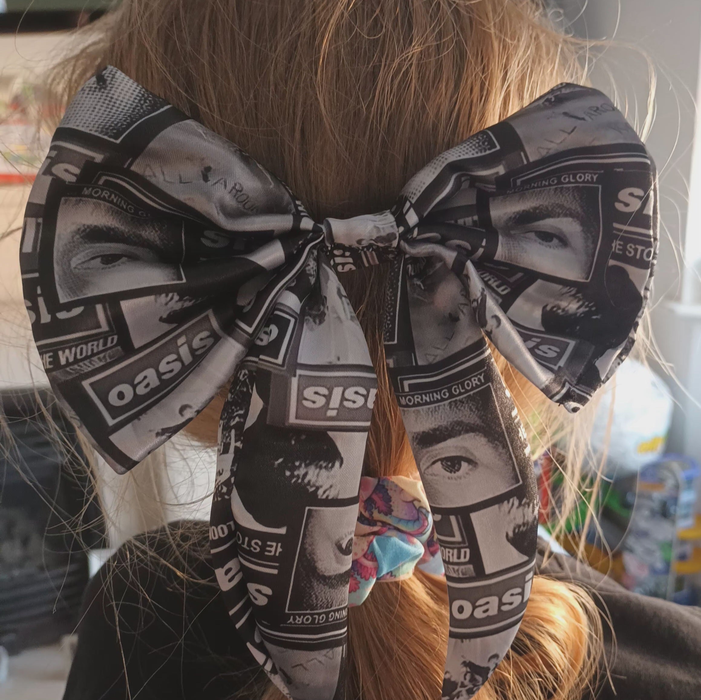 Oasis satin fabric hair bow on a clip