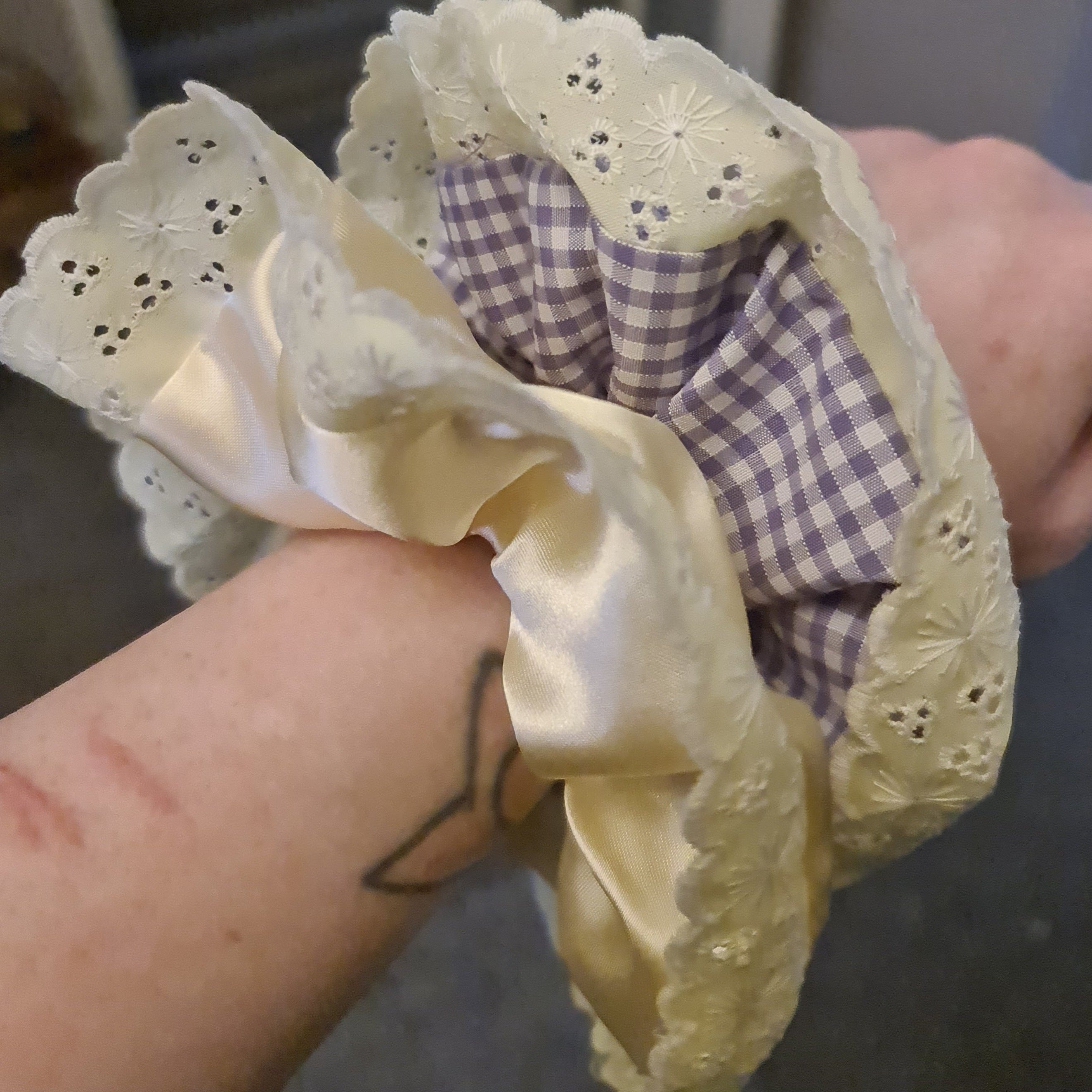 Two scrunchies, one Yellow Satin with lace edge and Purple Gingham with yellow lace trim