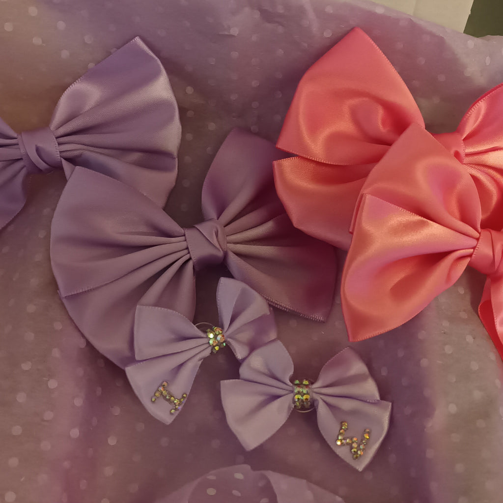 Purple & hot pink croc bow charms 