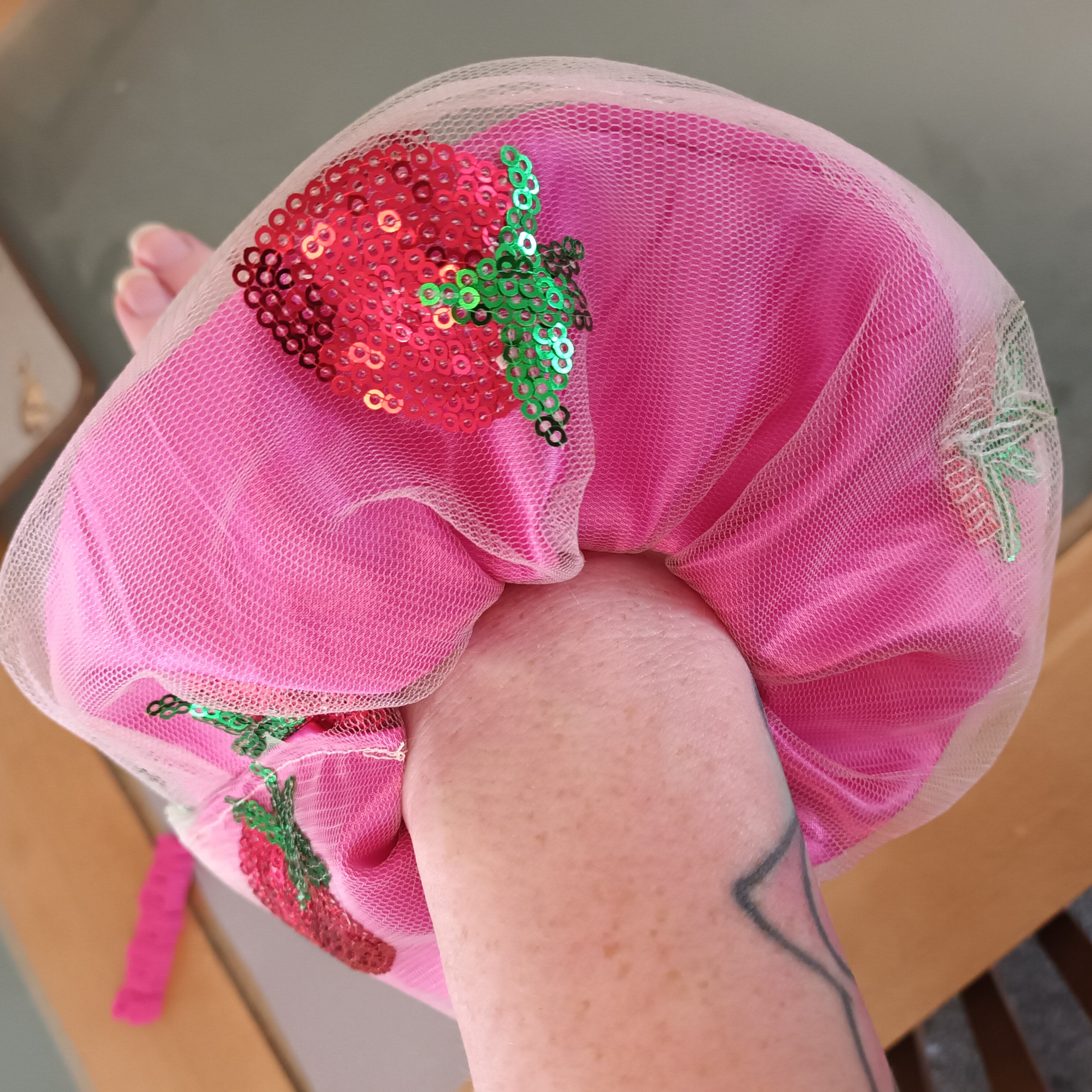 Sequin strawberry embroidered on a scrunchie 